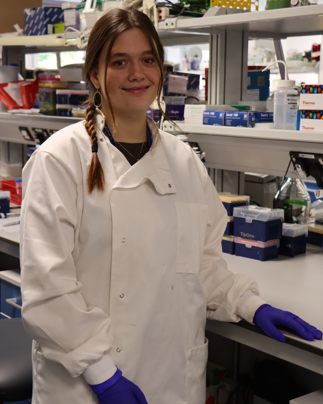 Amy at her bench in the lab.