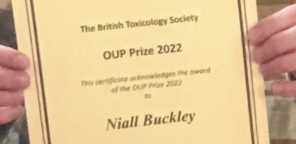 Niall holding his BTS prize certificate